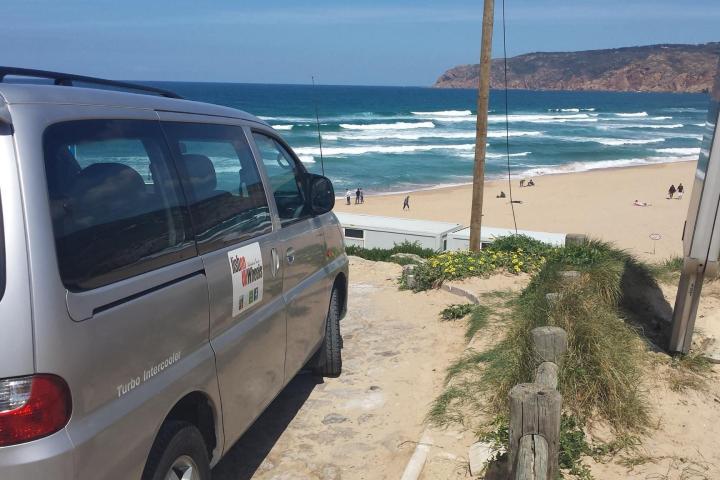a car parked on a beach