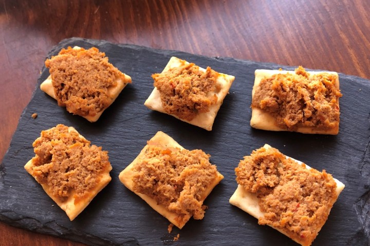 a piece of bread on a wooden table