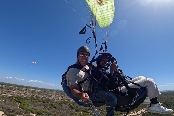 a man holding a kite