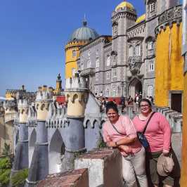 a man standing in front of a building