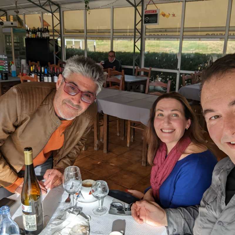 a couple of people sitting at a table