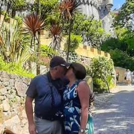 a man standing on a sidewalk