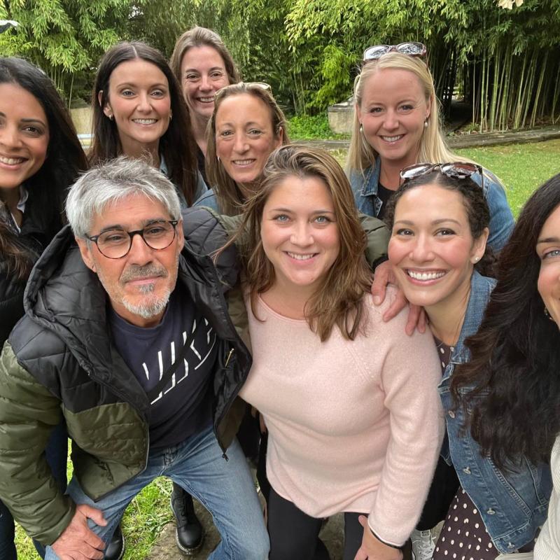 a group of people posing for a photo