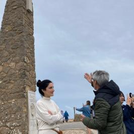 a group of people standing in front of a building