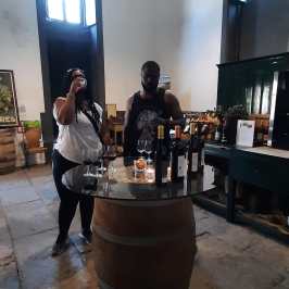 a person standing in front of a mirror posing for the camera