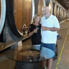 a person standing in front of a barrel