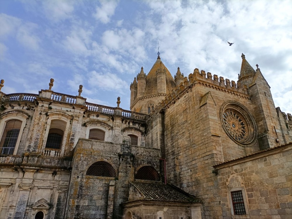 a large stone building with a clock tower