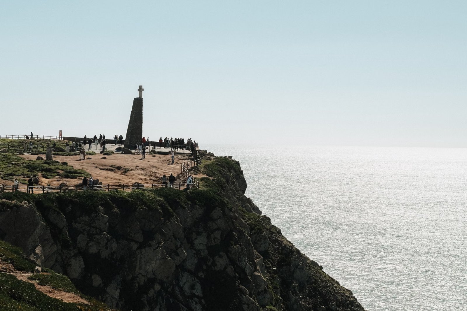 Cabo da Roca monument marking the westernmost point of mainland Europe, with cliffs and the Atlantic Ocean