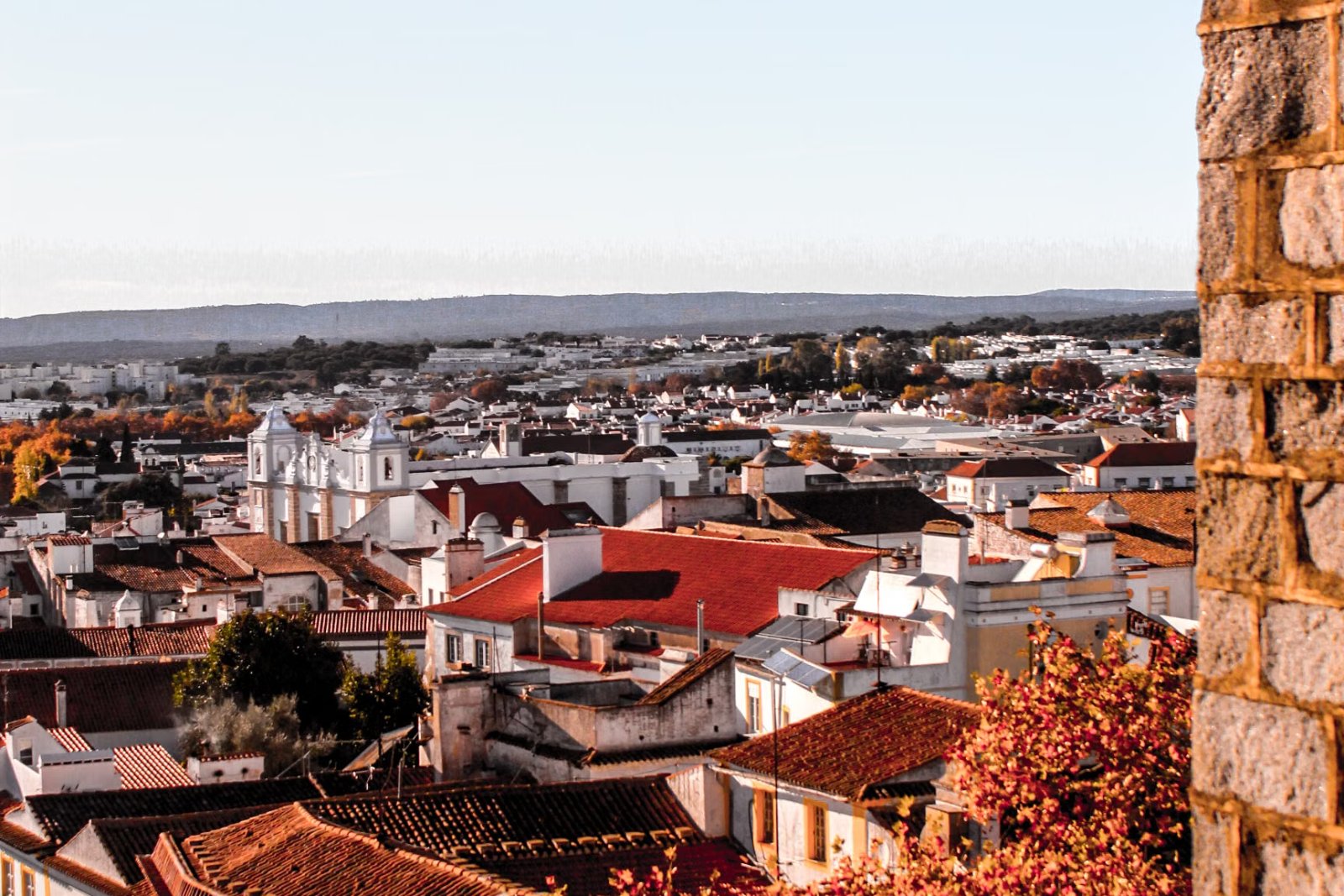 Rooftops of Évora with the Alentejo plain beyond